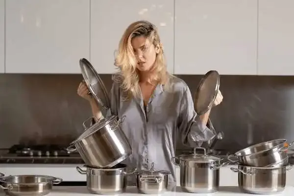 overworked-house-woman-housewife-cooking-600nw-2244121173.webp